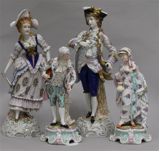 A pair of Thuringian figures, Gallant and Companion and a pair of similar Sitzendorf figures Largest 35cm.